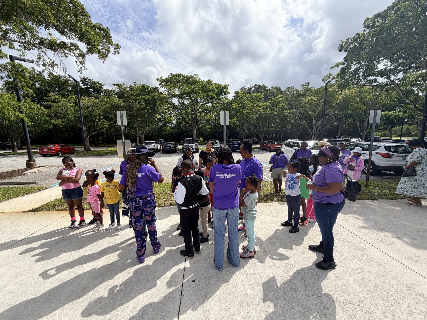 Children and Federation chaperones gathering during a community field trip